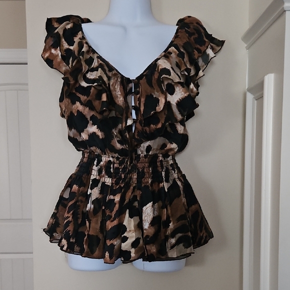 Luxe Tops - Luxe Black and brown Sleeveless Peplum Blouse